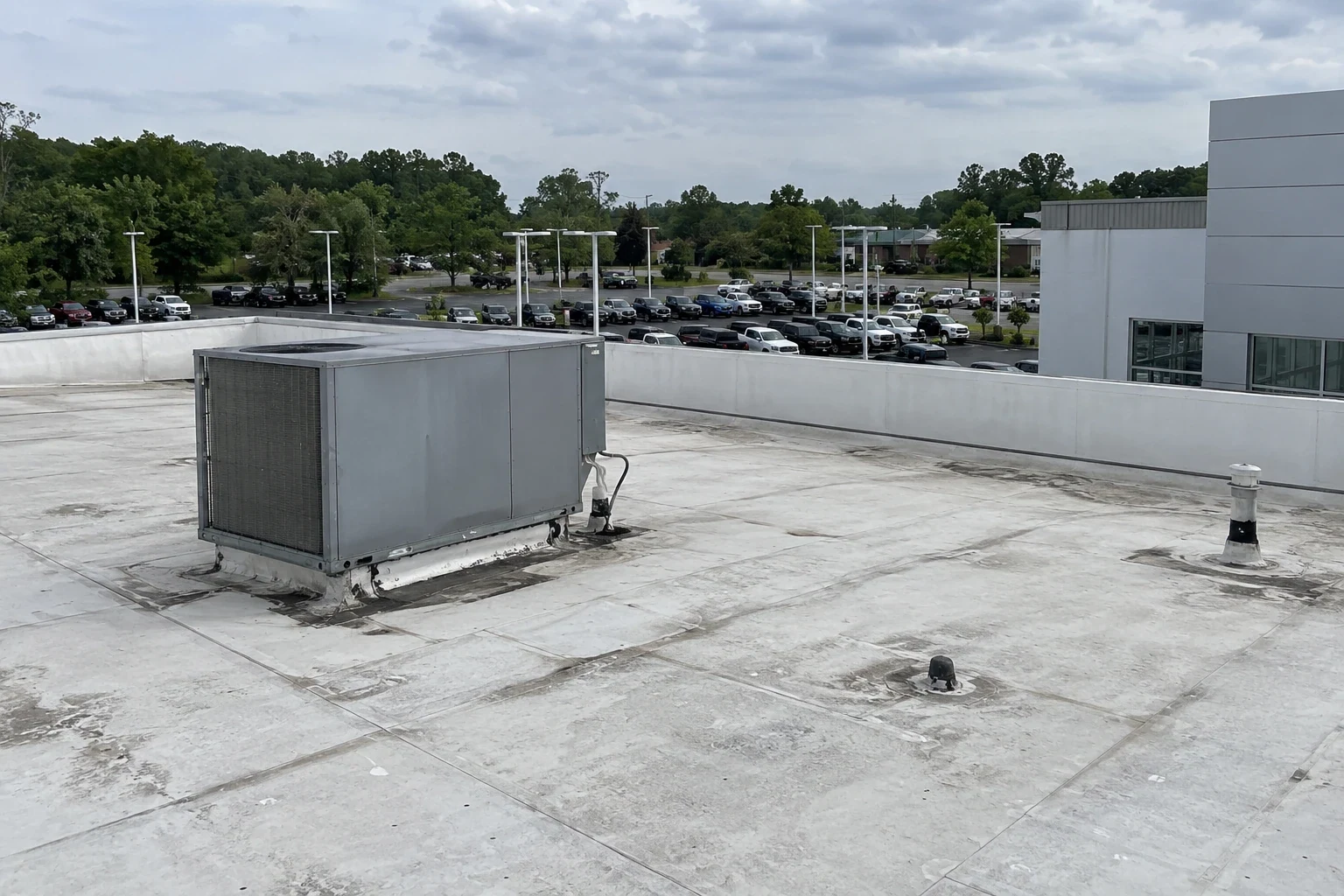 Auto Dealership Roofing in Longview, TX Auto Dealership Roofing in Longview, TX